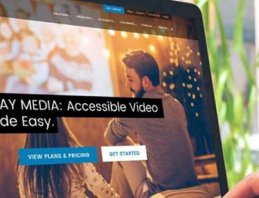 laptop screen showing the title: 3 Media Web Receives Five Communicator Awards