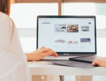 two women discussing the cost of making a website accessible