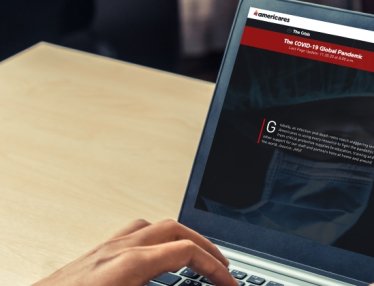 Americares homepage on a laptop