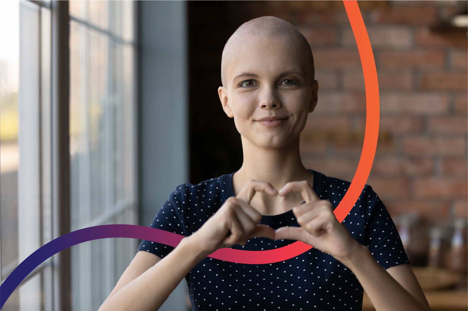 Patient making a heart shape with her hands, framed by the Claritas Rx brand ribbon