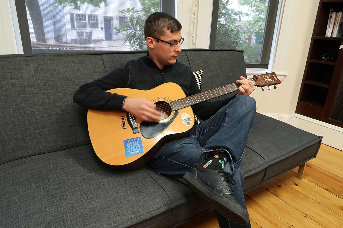 Mike St. Jean playing guitar