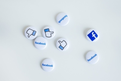 eight small buttons with Facebook logos on them