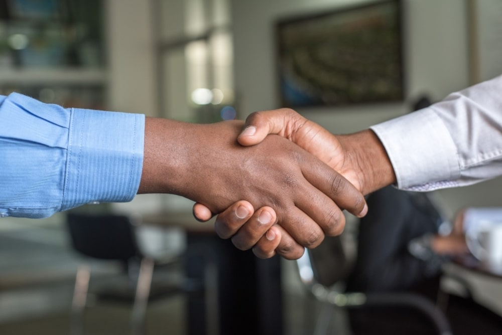 two businessmen shaking hands 