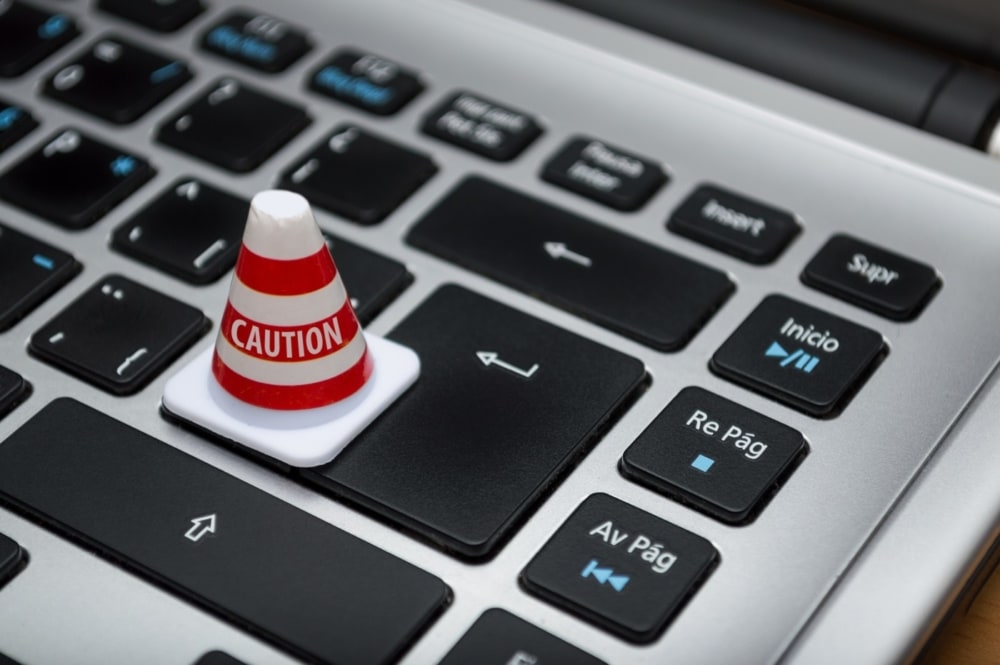 keyboard with security warning on it indicating consumers should use caution and exercise their rights in the ccpa and the gdpr