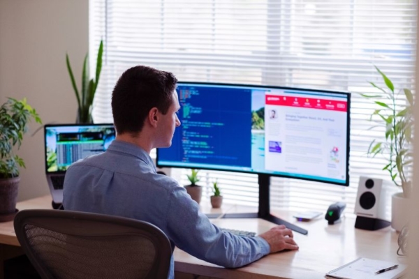 businessman sitting at computer