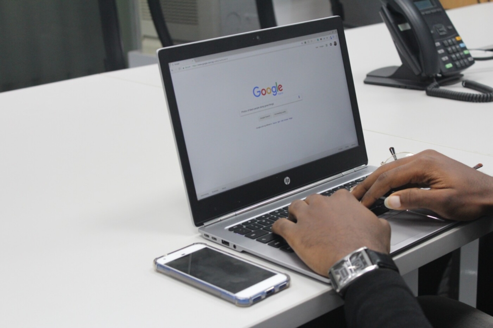 businessman typing on computer