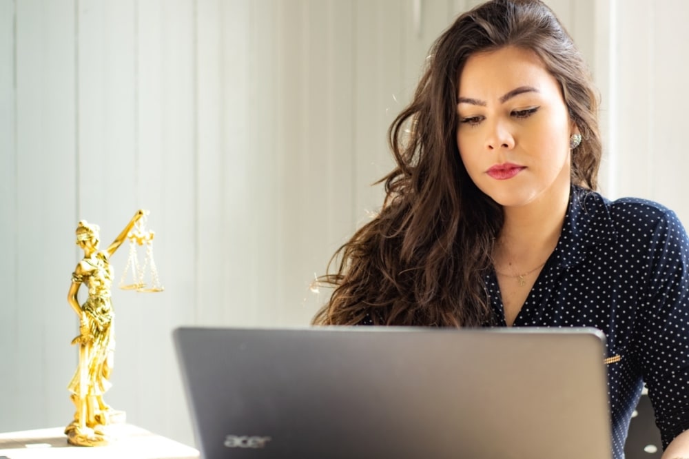 woman typing on computer