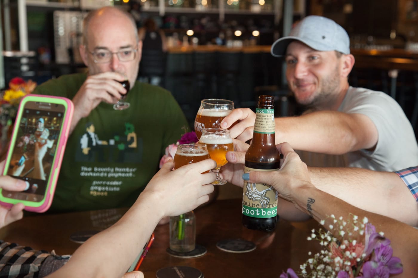 3 Media Web employees enjoying beer at Medusa