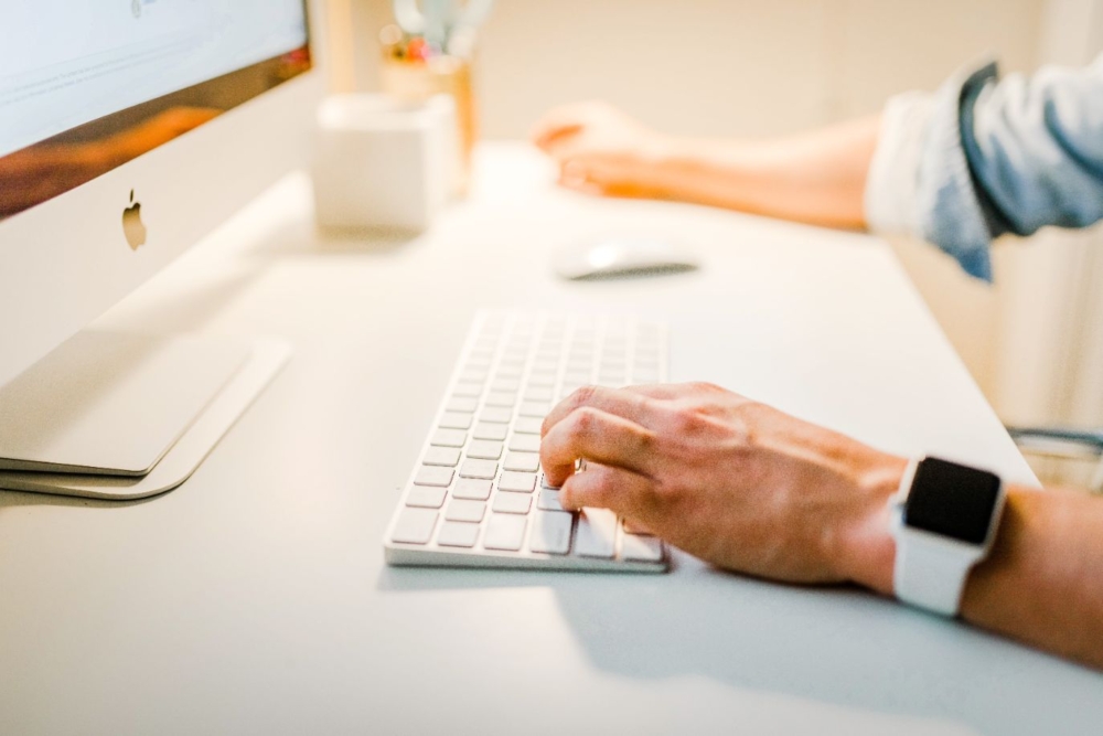 businessman typing on keyboard